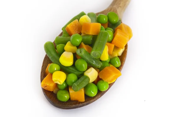 Diced vegetables in wood spoon — Stock Photo, Image