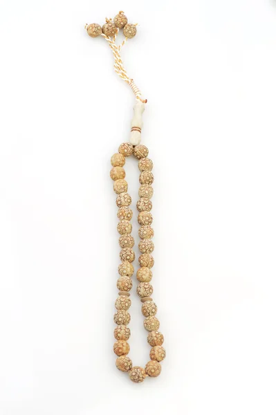 Rosary on white background — Stock Photo, Image