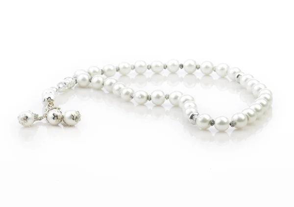 Rosary on white background — Stock Photo, Image