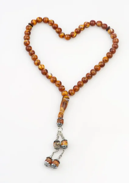 Heart shape of rosary — Stock Photo, Image