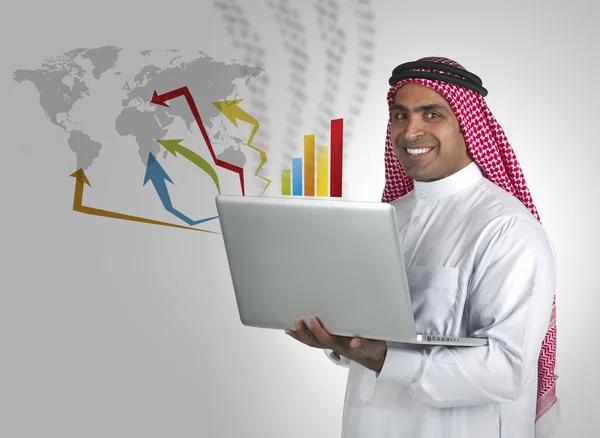 Arabian man works on laptop — Stock Photo, Image