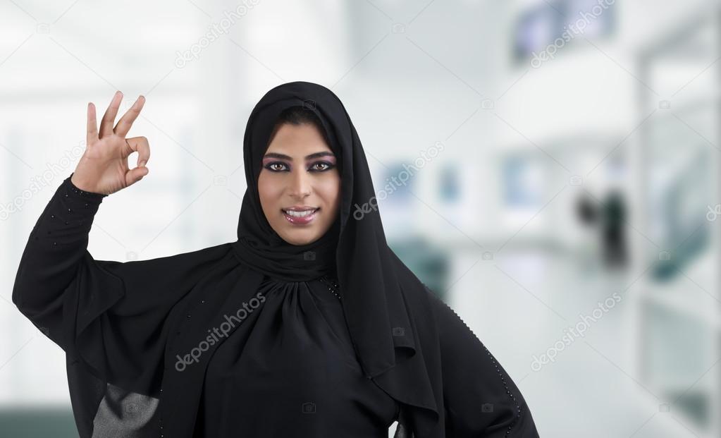 Arabian woman showing OK
