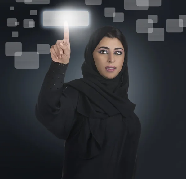 Arabian woman pressing touchscreen — Stock Photo, Image