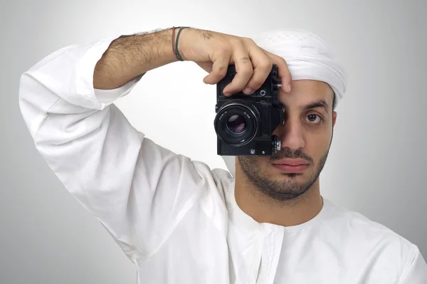 Arabian man using camera — Stock Photo, Image