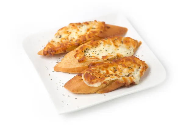 Tres piezas de pan de ajo rematado con queso —  Fotos de Stock