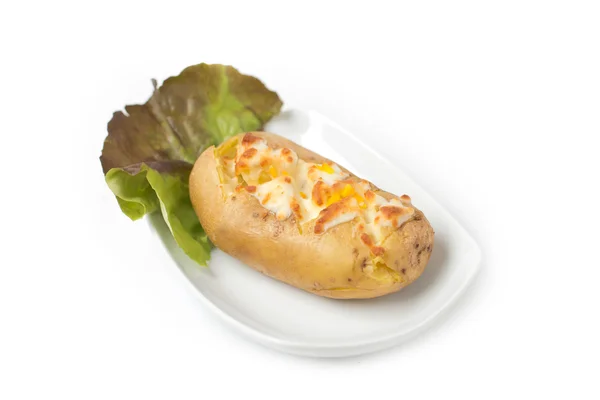 Baked potato with ham and grated cheeses — Stock Photo, Image