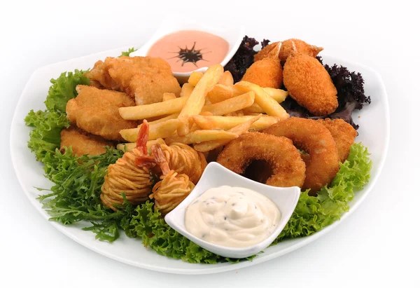 Calamari onion rings and fried fish — Stock Photo, Image