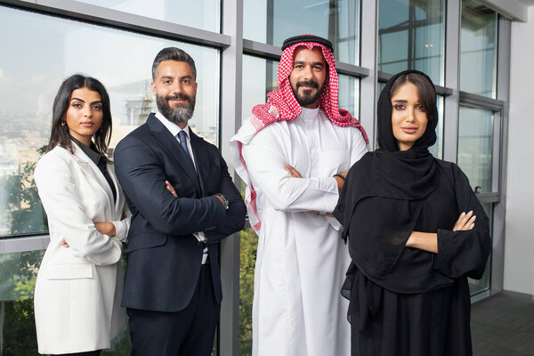 Multiethnic corporate business team in the office - Office workers, entrepreneurs and company employee at work in a multinational company