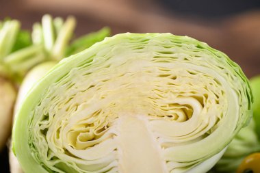 Lahana dokusunun yarısını kapat, organik sebze, yiyecek malzemesi.