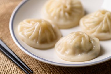 Xiao long bao, küçük Çin buğulama ekmeği kıymalı domuz eti.