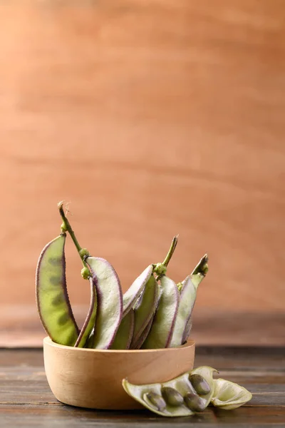 Asiático Hyacinth Feijão Tigela Fundo Madeira — Fotografia de Stock