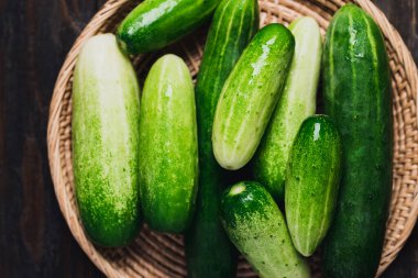 Fresh cucumber in basket, Organic vegetables from local farmer market