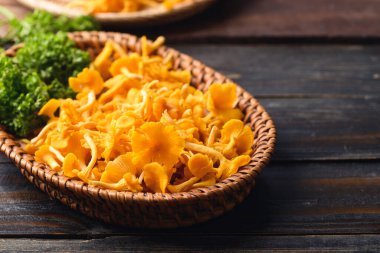 Edible orange mushroom in basket, Organic food ingredients in seasonal