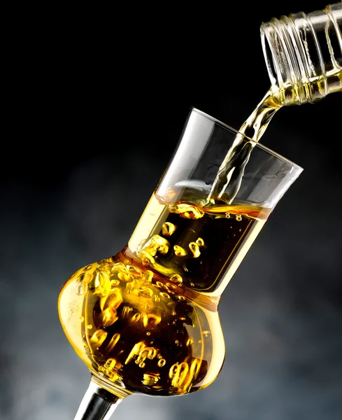 Glass with brandy — Stock Photo, Image