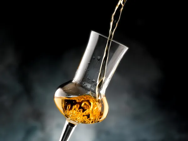 Glass with brandy — Stock Photo, Image