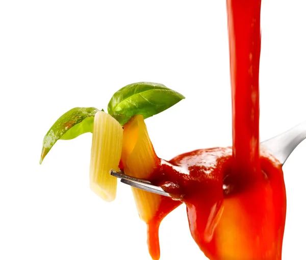 Basil pasta and tomato sauce on an isolated background — Stock Photo, Image