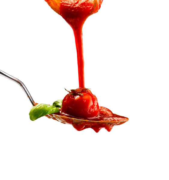 Basil pasta and tomato sauce on an isolated background