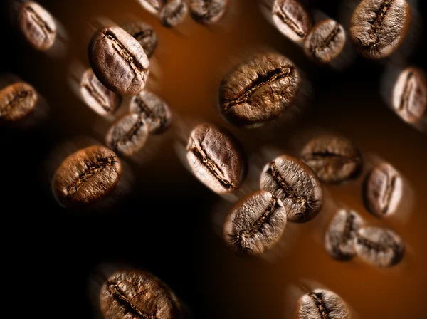 Flying coffee beans — Stock Photo, Image