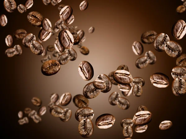 Flying coffee beans — Stock Photo, Image