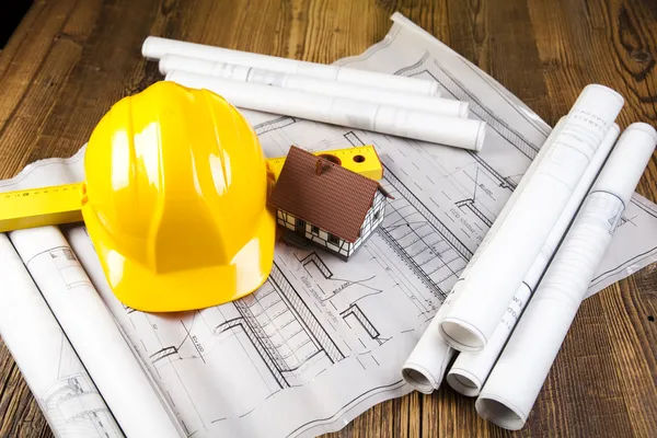 Building and construction equipment on blueprints — Stock Photo, Image