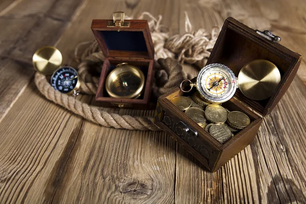 Chest of gold, compas with rope — Stock Photo, Image