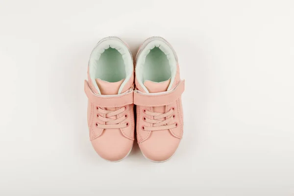 Sapatilhas Para Crianças Cor Rosa Fundo Branco Roupas Bebé Sapatos Imagens De Bancos De Imagens Sem Royalties