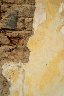 Soyut sarı çimento duvar dokusu ve arka plan. Modern duvar kâğıdı. Duvarın bazı grunge efektleri ve çizgileri vardır. Arkaplan ve doku kavramı.