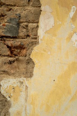 Soyut sarı çimento duvar dokusu ve arka plan. Modern duvar kâğıdı. Duvarın bazı grunge efektleri ve çizgileri vardır. Arkaplan ve doku kavramı.