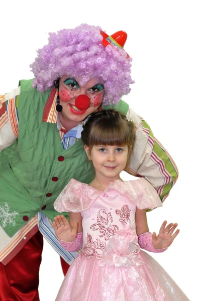 Das kleine Mädchen und der Clown. — Stockfoto