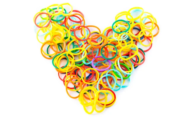 Heart shape of colorful hair bands — Stock Photo, Image