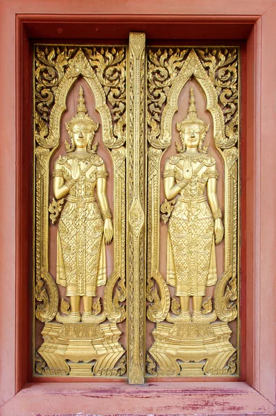 Thai sculpture style on temple door — Stock Photo, Image