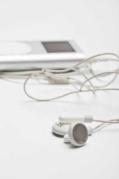 Auriculares y reproductor de mp3 — Stockfoto