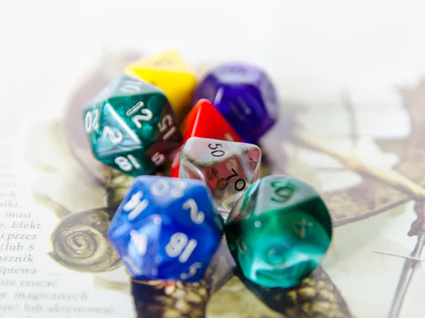 Role playing dices lying on picture background — Stock Photo, Image