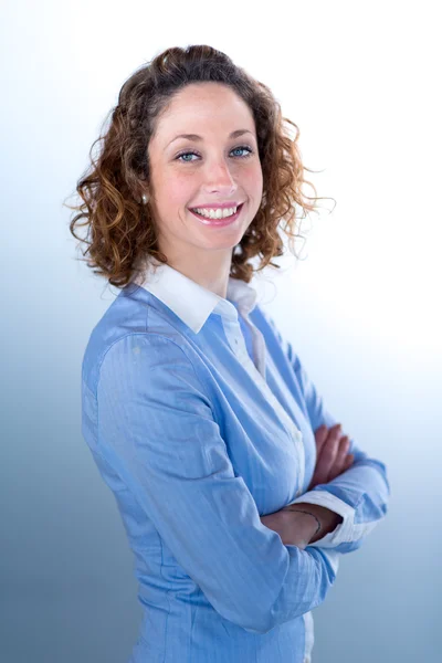 Portrait of a young executive woman on light backgroung — Stock Photo, Image