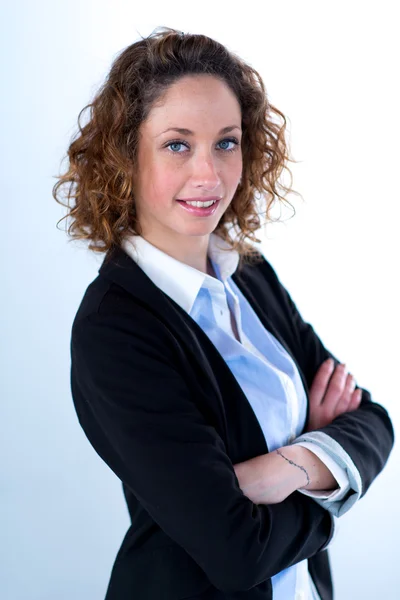Portrait of a young executive woman on light backgroung — Stock Photo, Image