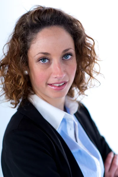 Portrait of a young executive woman on light backgroung — Stock Photo, Image