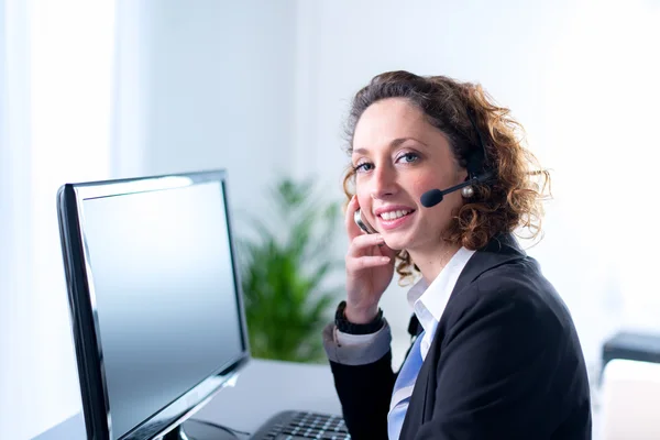 Portrait of an attractive young woman operator — Stock Photo, Image