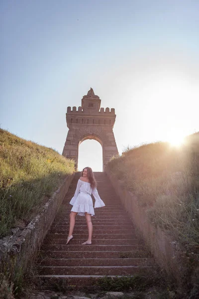 Young Happy Woman Dancing White Summer Dress Stands Concrete Staircase — Stock Fotó