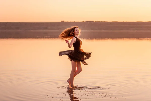Bright Sunny Silhouette Young Curly Dancer Airy Black Dress Water — Foto de Stock
