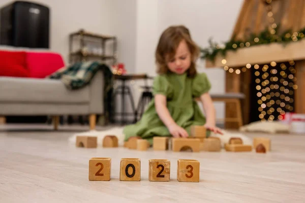 Wooden Cubes Numbers 2023 Stand Floor Row Background Blurred Unhappy — Fotografia de Stock
