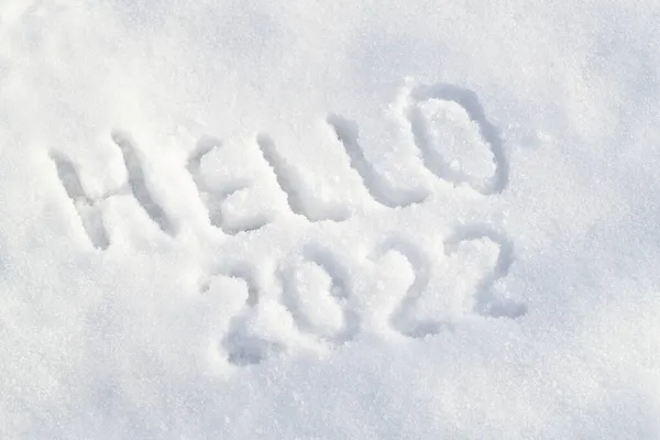 눈 표면 과 문자 Hello 2022. 흰 눈 위에서 징병당하다 — 스톡 사진