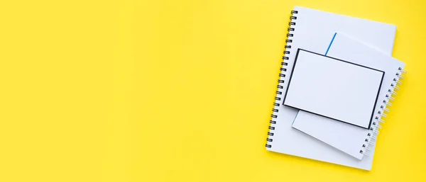 Stack Blocks Notebooks Spiral Bright Yellow Background Banner Copyspace Top — Stok fotoğraf