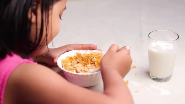 Slow Motion Video Indian Girl Child Eating Cornflakes Milk Side — Stock Video