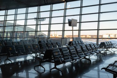 Moscow, Vnukovo Airport (VKO). March 1, 2020. A lot of seats in the airport's international terminal are completely empty. There are no passengers at the airport and no shops visitors.