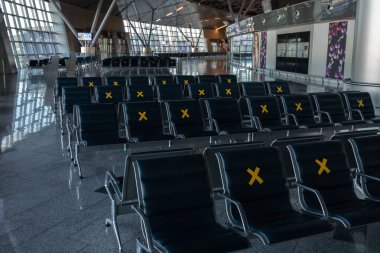 Moscow, Vnukovo Airport (VKO). March 1, 2020. A lot of seats in the airport's international terminal are completely empty. There are no passengers at the airport and no shops visitors.