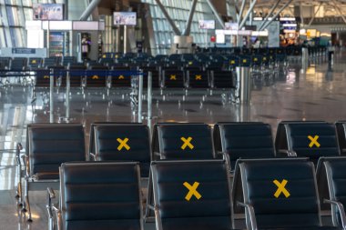Moscow, Vnukovo Airport (VKO). March 1, 2020. A lot of seats in the airport's international terminal are completely empty. There are no passengers at the airport and no shops visitors.