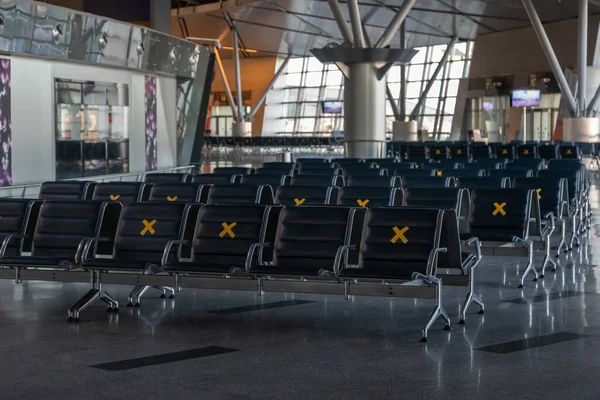 Moscow, Vnukovo Airport (VKO). March 1, 2020. A lot of seats in the airport's international terminal are completely empty. There are no passengers at the airport and no shops visitors.
