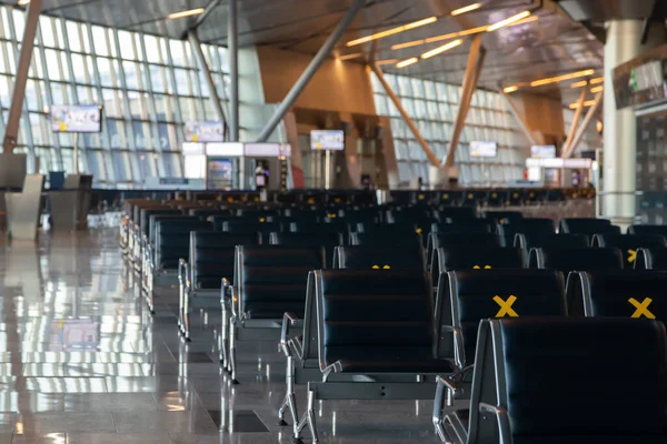 Moscow, Vnukovo Airport (VKO). March 1, 2020. A lot of seats in the airport's international terminal are completely empty. There are no passengers at the airport and no shops visitors.