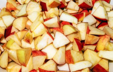 Yukarıdan taze kırmızı elma parçalarının arkaplan görüntüsü