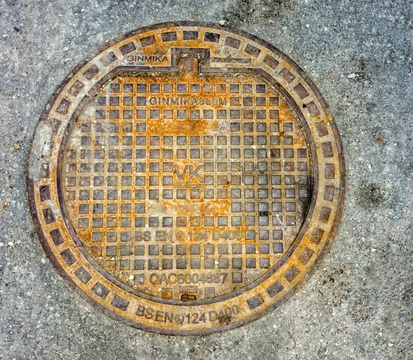 Sewer Manhole Cover Asphalt Pavement Top View City Panevezys Lithuania —  Fotos de Stock